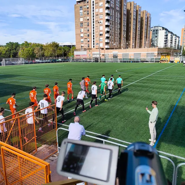 Ojeador de Fútbol grabando un partido